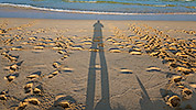 471: 725626-shadow-man-on-Corraleo-Beach.jpg